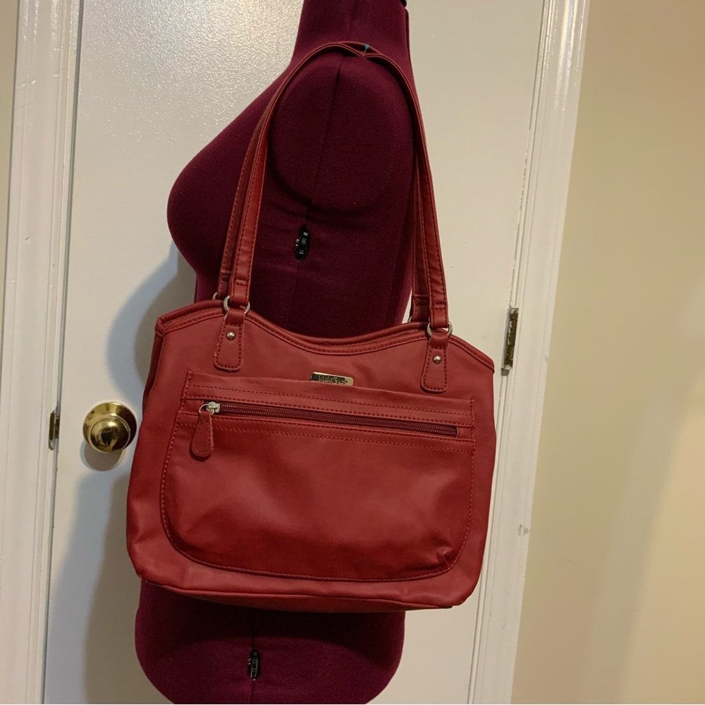 NWOT MultiSac Burgundy Faux Leather Shoulder Bag has lot of storage